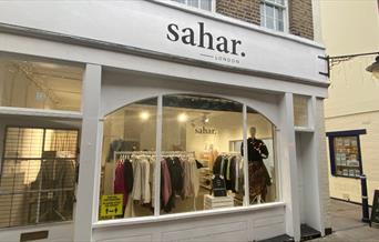 Outside Sahar in Greenwich. An elegant and stylish shop filled with clothing.