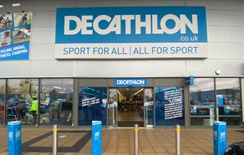 Outside Decathlon in Charlton, a large building with a huge selection of sporting goods.
