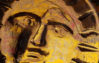 Gold sun artefact