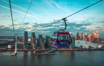 IFS Cloud Cable Car passing over Greenwich Peninsula in front of The O2 arena