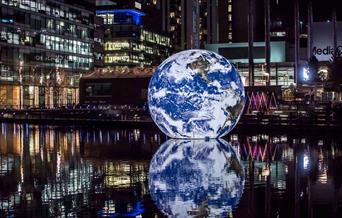 Floating Earth, a magical globe by artist Luke Jerram will be floating in the water of Middle Dock