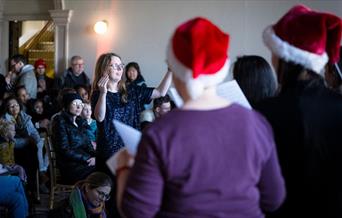An evening of carols and songs performed by local choir, Hithertones