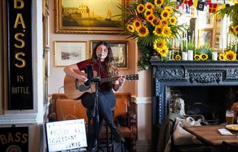 Enjoy the soulful and vibrant sounds of Sian Kelly as she brings dark pop and grunge to Trafalgar Tavern, Greenwich