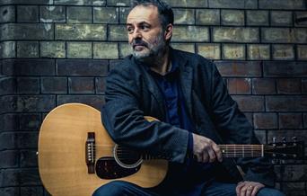 London based Americana singer-songwriter Dave Sutherland, grew up in Greenwich, with one of his very first gigs