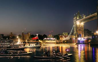 An illuminated flotilla of over a hundred and fifty boats, including Gloriana The Queen’s Rowbarge, will float down the River Thames