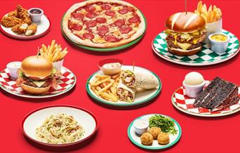 Frankie and Benny's serves Italian American cuisine including pizzas, pastas, burgers, chicken strips and more.