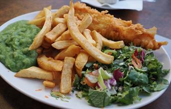 Serving Traditional British Fish & Chips