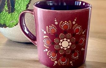 Experience the power of colour and learn how to paint a mandala on a mug