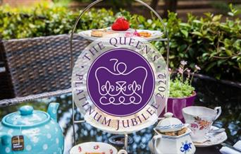 Celebrate the Queen's Platinum Jubilee with your loved ones within the stunning Tudor Gallery