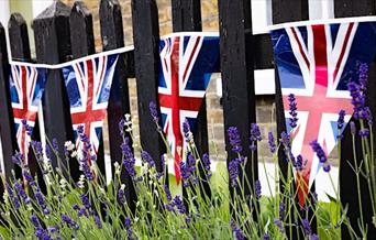 Watch the Coronation of HM King Charles III on the Woolwich big screen
