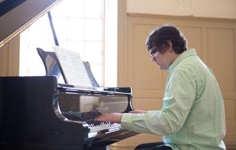 Image of pianist Slava Antipov - A graduate of the Royal Academy of Music and Trinity Laban