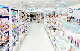 Inside Boots, showing a nice looking and well stocked shop.