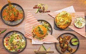 A Table filled with delicious looking food, all from the Yak and Yeti Restaurant in Eltham.