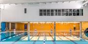 Inside Thamesmere Leisure Centre, showing a bright blue swimming pool.