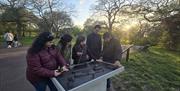 An outdoor adventure company that blends immersive storytelling with high-stakes treasure hunts