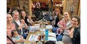 ‘Bring Your Baby Pub Quizzes’ are fun, brain-stimulating daytime parent socials, which take place all over London. In GREAT pubs