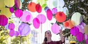 A colourful exhibition celebrating natural light across the Canary Wharf estate