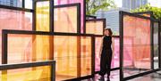 A colourful exhibition celebrating natural light across the Canary Wharf estate
