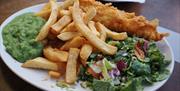 Serving Traditional British Fish & Chips