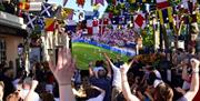 People watching FIFA World Cup on a big screen outside Trafalgar Tavern in Greenwich