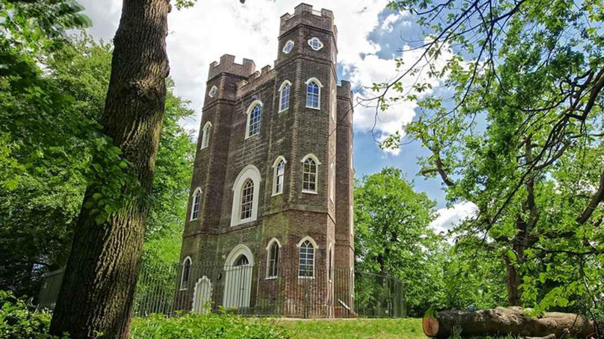 Severndroog Castle surrounded by trees.