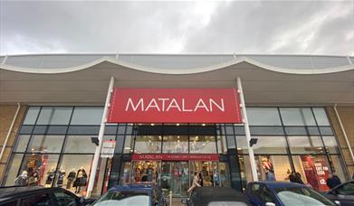 Outside Matalan in Charlton, showing a huge modern building with an amazing selection of items.