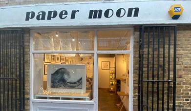 Outside Paper Moon in Greenwich. A creative and fascinating shop filled with art.