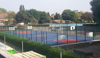 Hornfair Park basketball court with blue and red markings on the ground