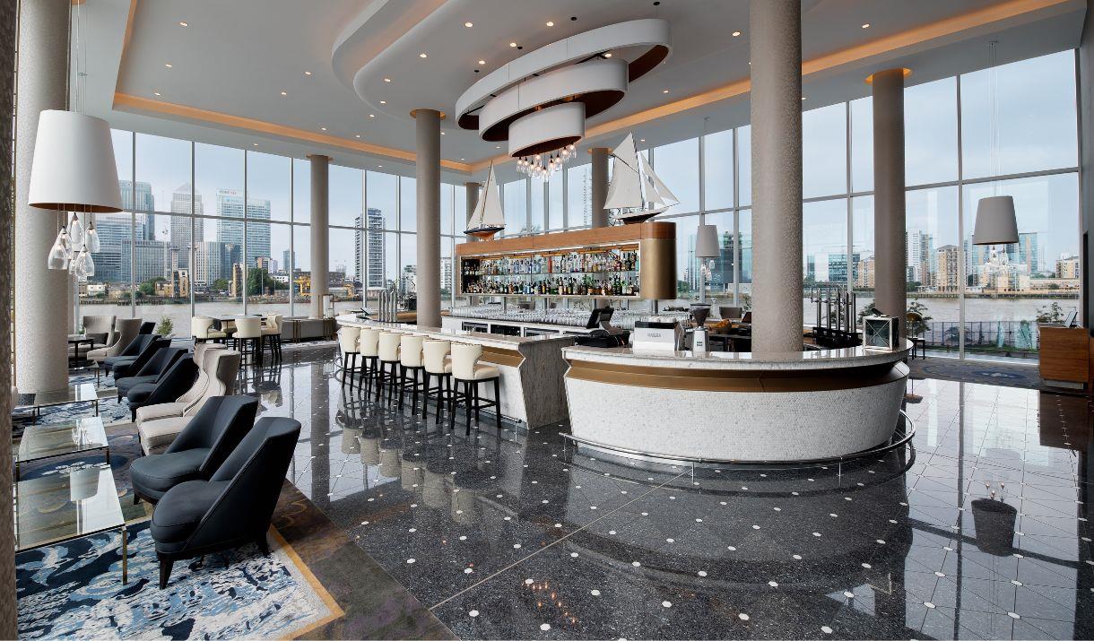The Clipper Bar at the InterContinental London - The O2. With floor to ceiling windows that overlook the river Thames and Canary Wharf