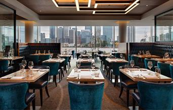 The luxurious interiors of the Market Brasserie at InterContinental London - The O2, overlooking Canary Wharf