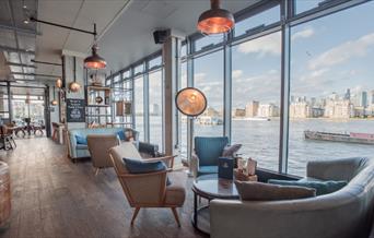 The Sail Loft has panoramic views of the river Thames from its floor to ceiling windows.