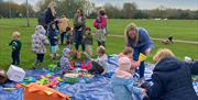 Kids having school holiday fun at Play in the Park provided free at locations across the district by Epping Forest District Council