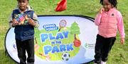 Kids having school holiday fun at Play in the Park provided free at locations across the district by Epping Forest District Council