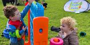 Kids having school holiday fun at Play in the Park provided free at locations across the district by Epping Forest District Council