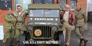 American GIs and their Jeep outside North Weald Station re-enacting wartime Britain on Epping Ongar Railway