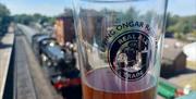 Image of a Real Ale Trains branded glass
