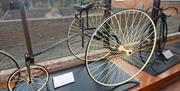 John Collins Collection National Royal Tricycle 1884. Safer than a Penny Farthing, it has two large front driving wheels and rack-and-pinion steering.