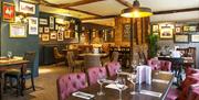 Dine in traditional surroundings at the Kings Head, North Weald.