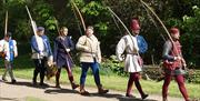 Archers with long bows at an International Living History Festival