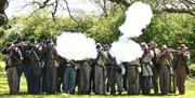 American Civil War Confederate soldiers volley firing at an International Living History Festival