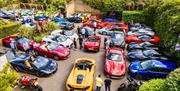 Sheesh Chigwell carpark with supercars