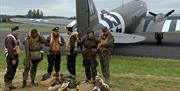 American aircrew and parachutists reenactors at The Squadron D-Day80 Heroes Remembered event at North Weald Airfield