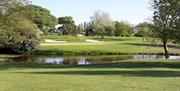 Brentwood Golf Club lake and green on hole 6