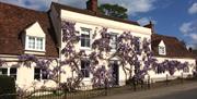 Cambridge House in Roydon, listed Grade II.