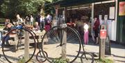 All types of bikes appear at the tea hut - such as these two penny-farthings.