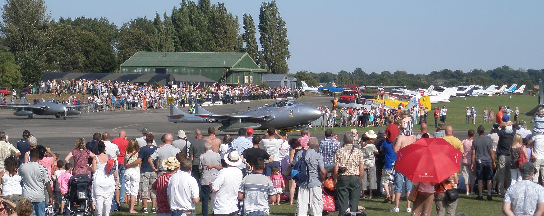 aircraft on display and crowds at North Weald Airfield