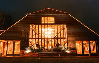 Night view of the Essex Barn wedding venue at Blake Hall Ongar