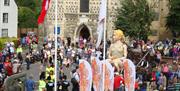 A giant puppet of Lady Godiva visits the historic centre of Waltham Abbey.