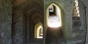 The passageways to firing points within the outer walls of the castle at Domfront.