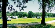 Caravans and motor homes at Debden House campsite.